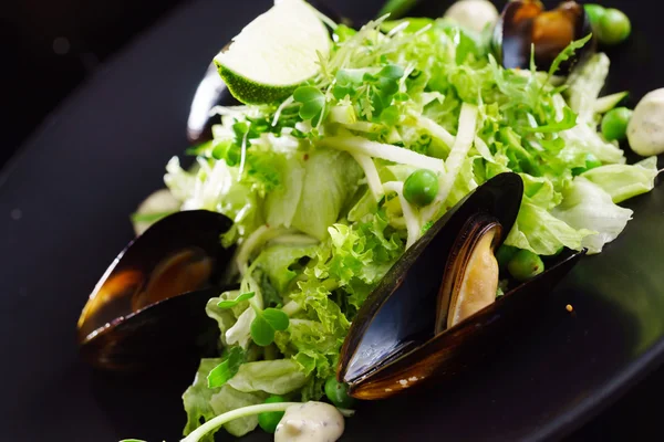 Fresh salad with mussels