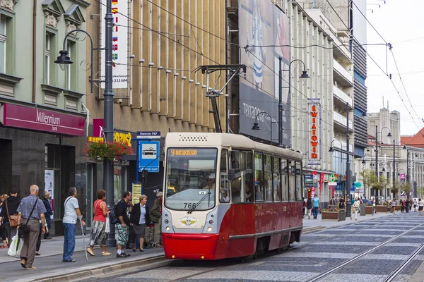 Red tram on the street of Katowice city, Poland