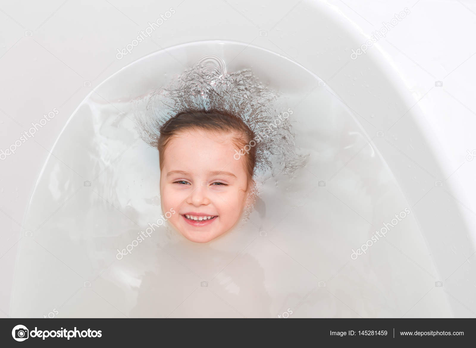 Little Girl In A Bathtub Diving Topview Stock Photo Tan4ikk Little Smiling Girl Swimming In A Bathtub Diving Face Above The Water Topview Photo By Tan4ikk