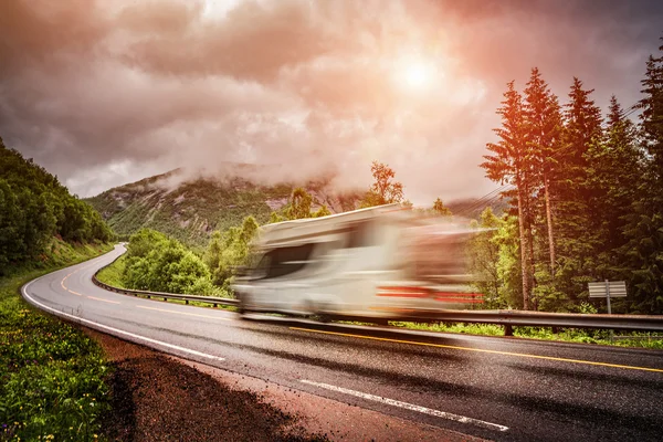 Caravan car travels on the highway.