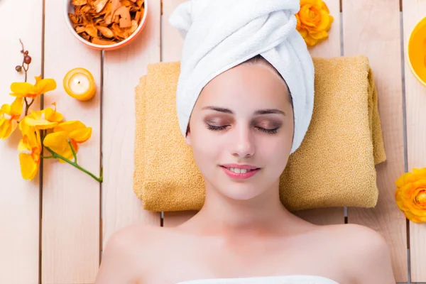 Young woman in spa health concept