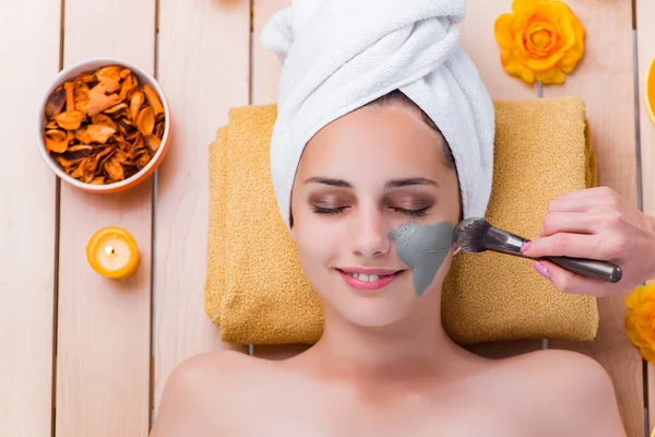 Young woman in spa health concept