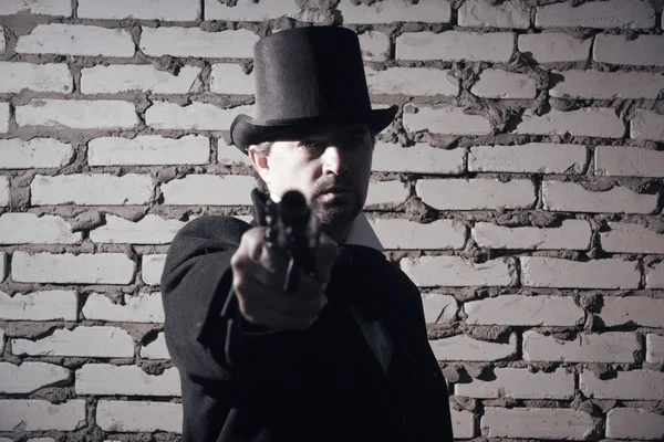 Victorian style man with old gun