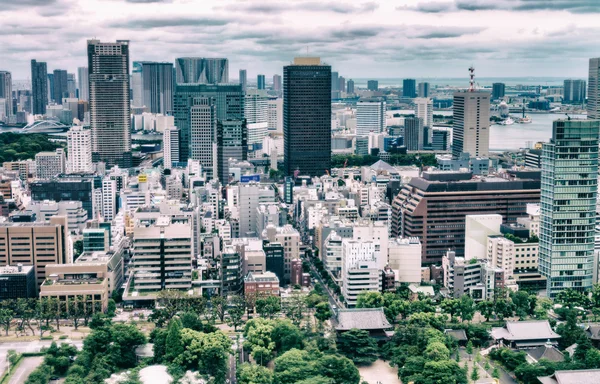 TOKYO - MAY 2016: Aerial view of city skyline. Tokyo attracts 15