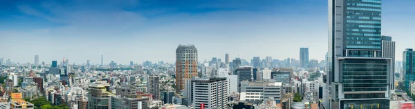 Aerial panoramic view of Tokyo buildings from Shibuya rooftop