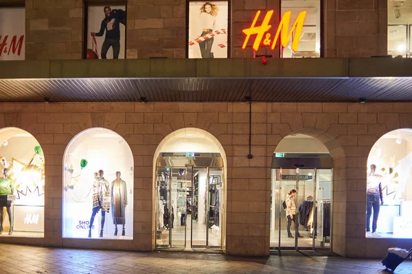 H&M store in Geneva at night
