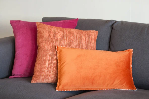 Colorful cushion on sofa cozy home autumn