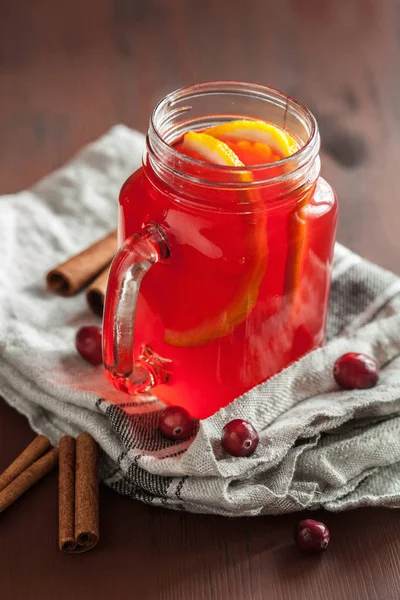 Hot cranberry tea with orange cinnamon warming drink