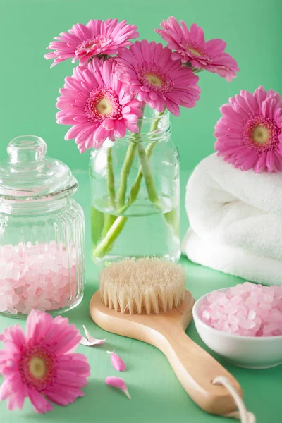 Spa aromatherapy with gerbera flowers saltl brush