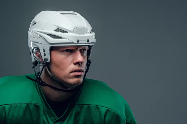 Hockey player with a helmet