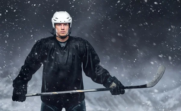 Hockey player in a snow storm.