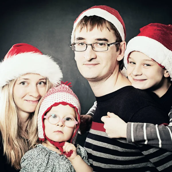 Little Children with Mother and Father. Christmas  Family