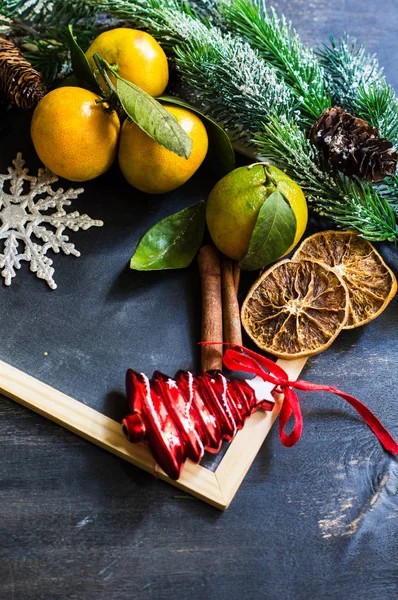 Christnas frame with fruits and spices