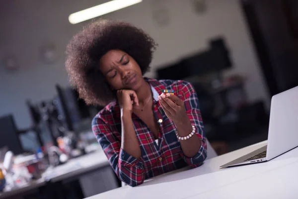 Young black woman at her workplace in modern office  African-Ame