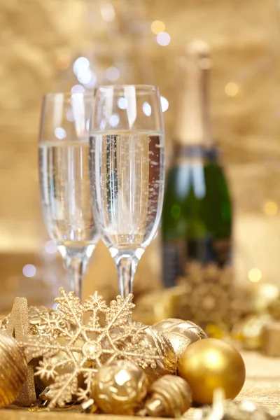 Champagne glasses and New Year decor