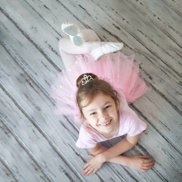 Little ballerina in a studio