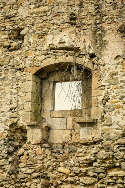 Crumbling wall with window