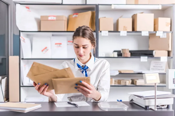 Woman working at the post office