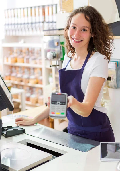 Woman working at grocery store