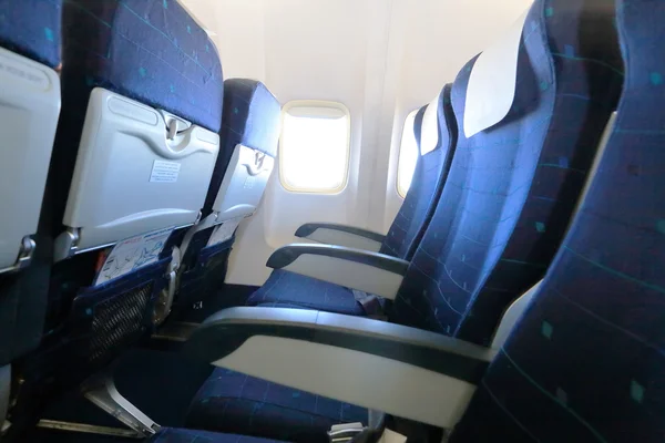 Blue empty airplane seats