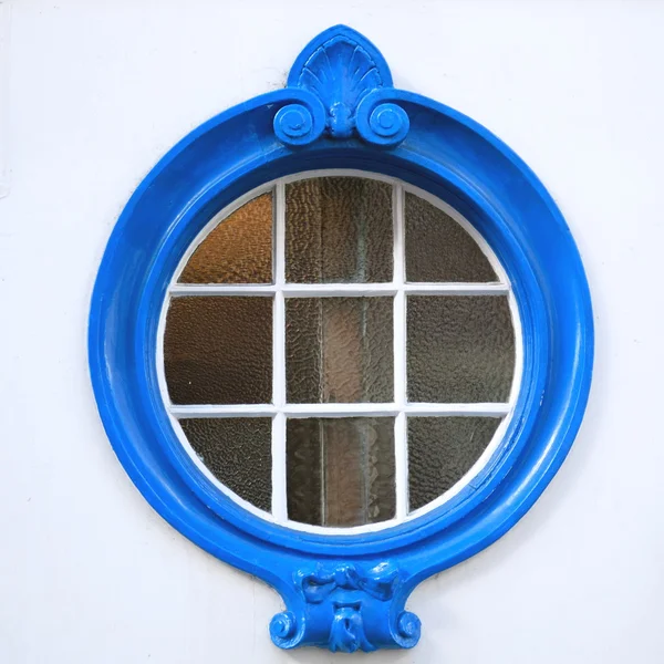 Blue wooden circle window