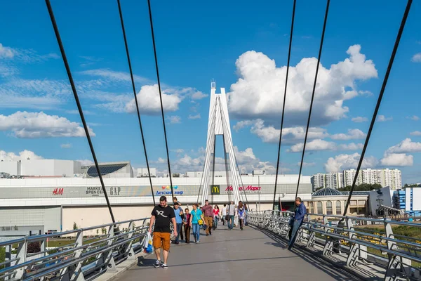 Krasnogorsk, Russia - July 09.2016. People go on cable-stayed pedestrian bridge.