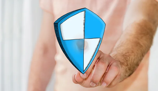 Man touching hand drawn shield safe protection icon