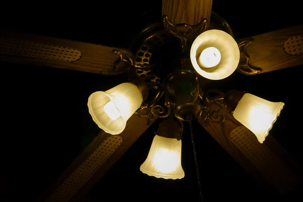 Ceiling fan with lights. Decorative ventilation with lamps on th
