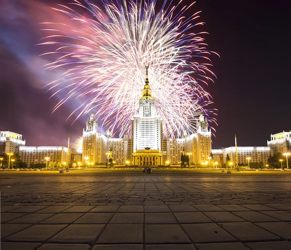 Main Building Of Moscow State University On Sparrow Hills at Night and holiday fireworks, Russia