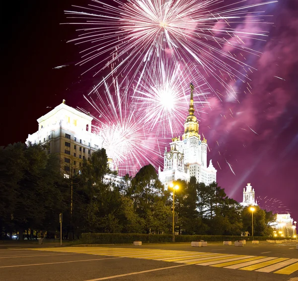 Main Building Of Moscow State University On Sparrow Hills at Night and holiday fireworks, Russia