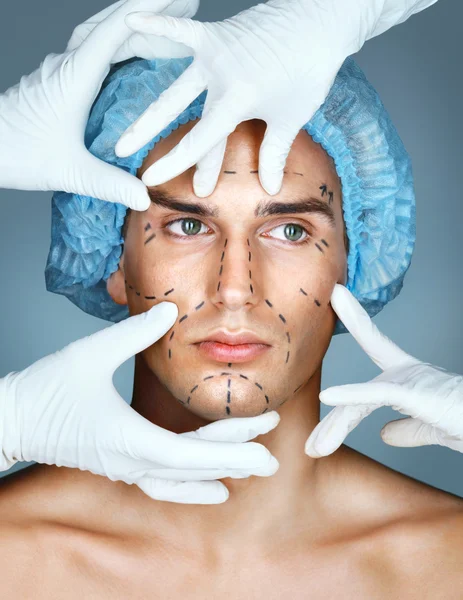 Beautiful Man with many surgical hands.