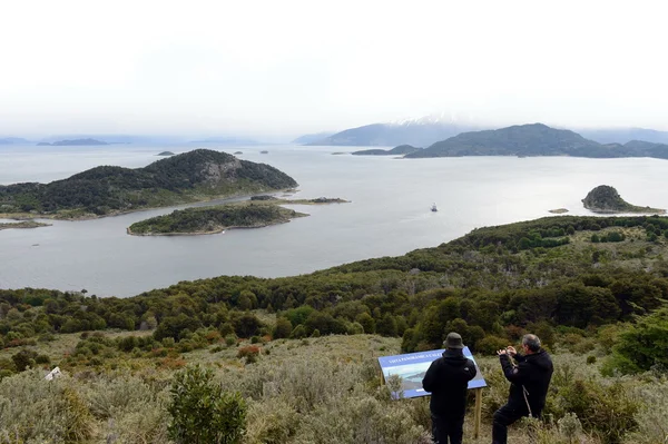 Tourists on the island of Navarino in Murray Channel in Tierra del Fuego.
