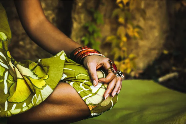 Woman in meditation position closeup