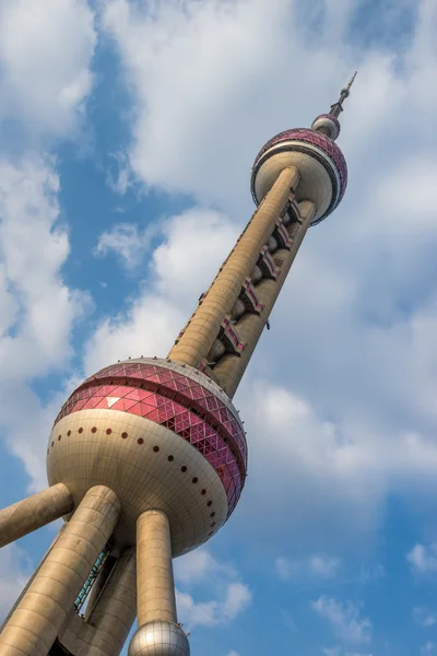 Oriental Pearl Tower with cloudy blue sky background, Shanghai,