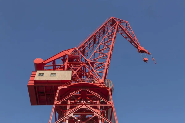 The crane in red
