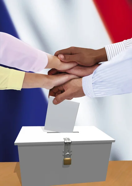 Group of French voters expressing unity, hands on top of each other.