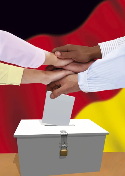Group of  German voters expressing unity, hands on top of each other.