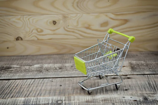 Empty mini shopping cart
