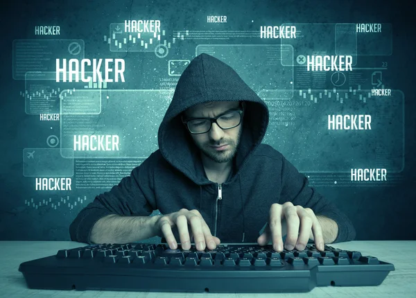 Hacker with keyboard and glasses