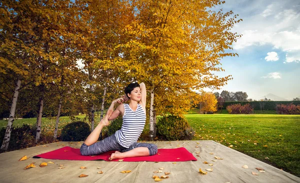 Yoga in the Autumn Park