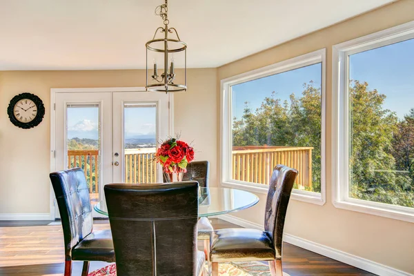 Bright sunny dining room with hardwood floor