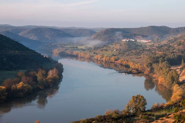 Foggy hills and river