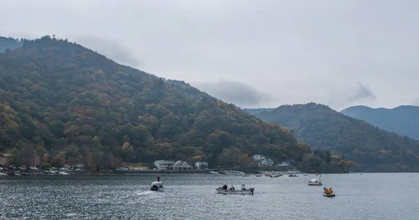 Locals and tourist enjoying leisure boating activities at Lake Chuzenji.
