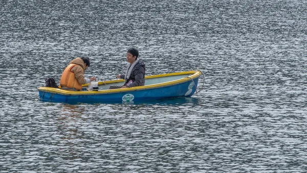 Locals and tourist enjoying leisure boating activities at Lake Chuzenji.