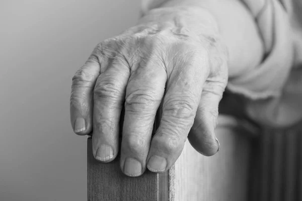 Wrinkled hand of a senior person