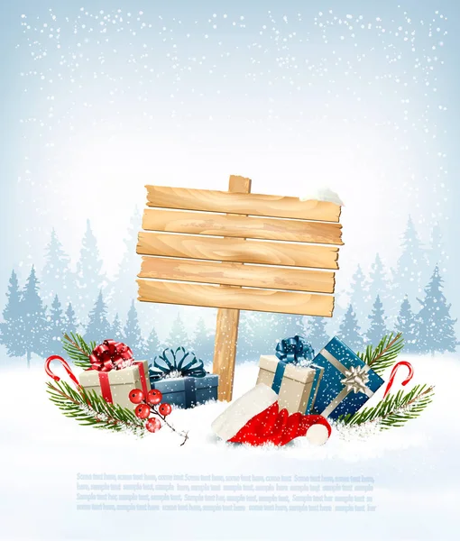 Winter background with gift boxes and a wooden ornate Merry Chri