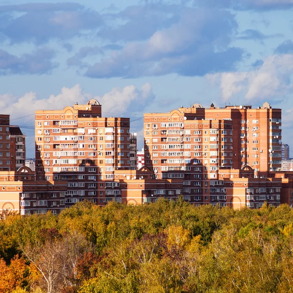 Apartment houses in living urban quarter in autumn