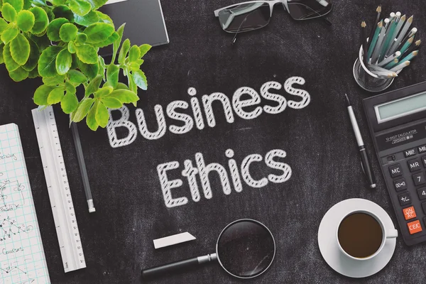 Business Ethics - Text on Black Chalkboard. 3D Rendering.