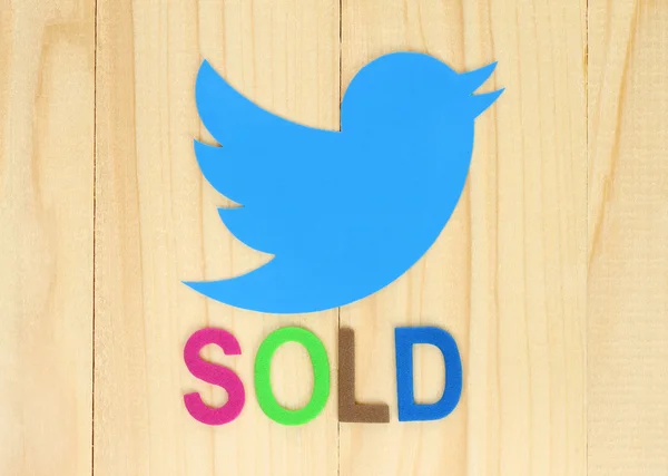 Twitter icon printed on paper with color label Sold