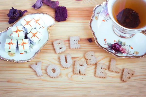 Be Yourself, inspirational slogan made from biscuit letters